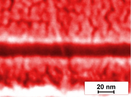 This picture of a high-resolution scanning electron microscope shows the source and drain contacts and the individual carbon nanotube forming the world's smallest nanotube transistor with a channel of just 18nm.